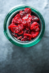 dried cranberries dried berries cherry sweet and healthy treat Menu concept serving size. food background top view copy space for text organic healthy eating