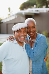 Naklejka premium Older couple smiling together outdoors