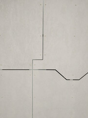 Abstract lines concrete panel clad building on a monochrome background