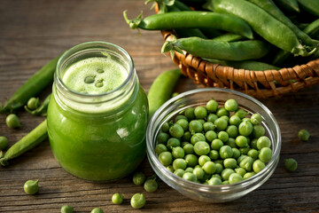 Cream of green pea soup in a glass jar