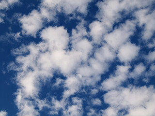 white clouds on blue sky