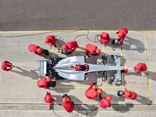 Tableaux ronds sur aluminium F1 Équipe de course travaillant à l& 39 arrêt au stand
