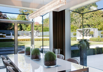 Centerpieces on table in modern dining room