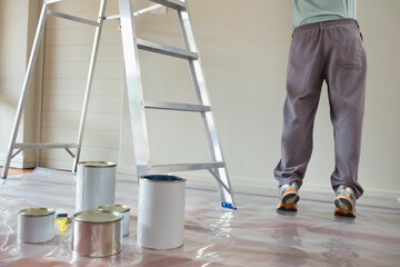 Man painting in room