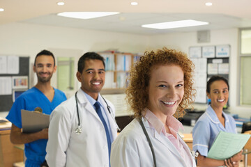 Doctors and nurse smiling in hospital