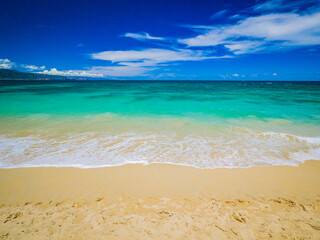 Baldwin Beach Park sunny day. Baldwin Beach Park is a beautiful, long white-sand beach on Maui's...