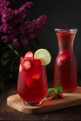 Drink strawberry compote with mint and lime, cocktail,  vertical, black background
