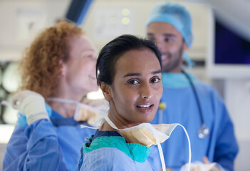 Surgeons standing operating room