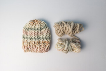 cute hand knit baby beanie hat and yarn 