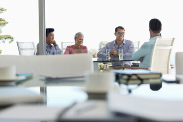 Business people talking in meeting