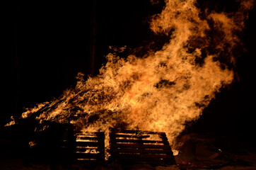 massive wood fire in winter night