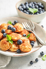 Dutch mini pancakes as simple and sweet snack