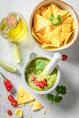 Fresh guacamole as a spicy mexican snack