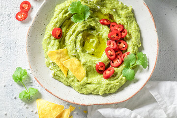 Traditional guacamole as a spicy mexican snack