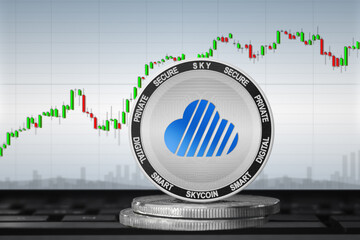 Skycoin cryptocurrency; Skycoin SKY coins on the background of the chart
