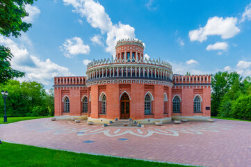 Third Cavalry Building at Tsaritsyno Estate of Queen Catherine the Great in Moscow, Russia. Tsaritsyno is a palace museum and park reserve. Travel and architecture.