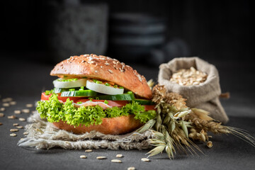 Sandwich with lettuce, egg and fresh tomato