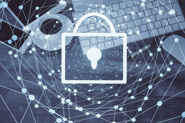 Double exposure of lock drawing over desktop. Top view. Security concept.