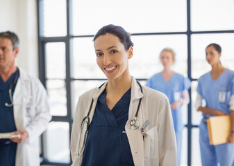 Portrait of smiling doctor in hospital
