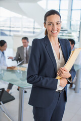 Portrait of smiling businesswoman in meeting