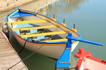 Fototapeta na wymiar Traditional wooden boats in Frontignan, a seaside resort in the Mediterranean sea, Herault, Occitanie, France 
