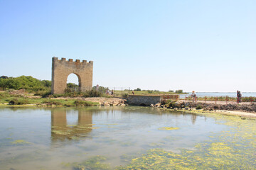 Triumphal arch of Villeneuve les Maguelone, a seaside resort in the south of Montpellier, Herault, France
