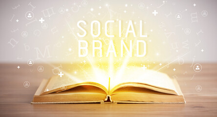 Open book with SOCIAL BRAND inscription, social media concept