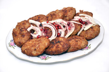 liver cutlets on a light plate. close up . Homemade cutlets on a white plate and white background.