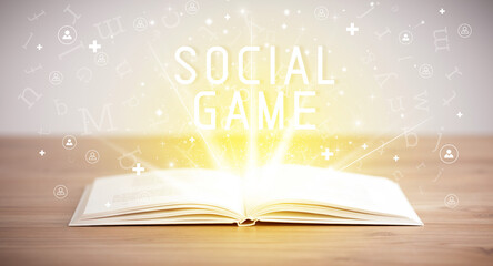 Open book with SOCIAL GAME inscription, social media concept