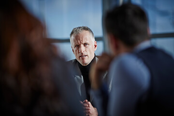 Business people talking in meeting