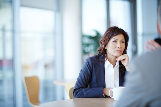 Business People Talking In Meeting