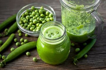cream of green pea soup in a glass jar