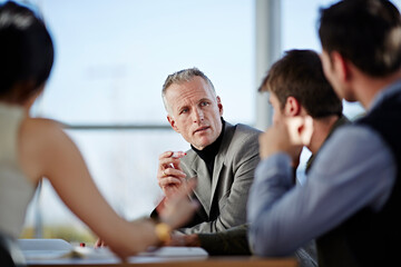 Business people talking in meeting