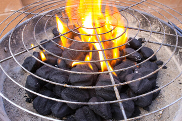 charcoal grill with flame