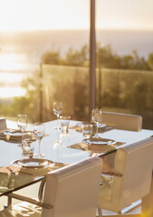 Set table in modern dining room