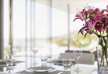 Set table in modern dining room