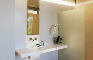 Faucet and sink in modern bathroom