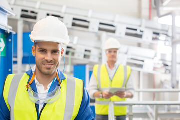 Workers smiling in factory