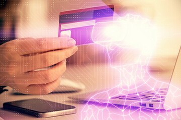 Multi exposure of woman on-line shopping holding a credit card and man in AR glasses drawing. E-learning concept.