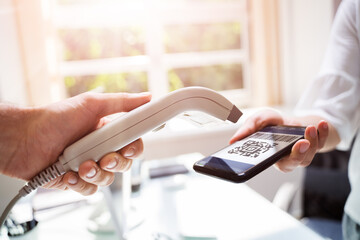 Using Mobile Phone To Scan Payment Code