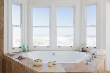 Jacuzzi tub in bathroom overlooking ocean