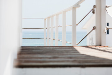 Wooden balcony overlooking ocean
