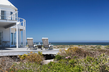 Lounge chairs on deck overlooking ocean