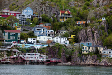 Fototapeta na wymiar Houses on craggy waterfront