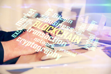 Double exposure of man's hands holding and using a phone and crypto currency blockchain theme drawing.