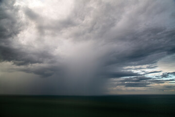 Obraz na płótnie Canvas Tropical Storm Cloudscape Seascape Rain