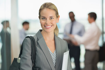 Businesswoman smiling in office