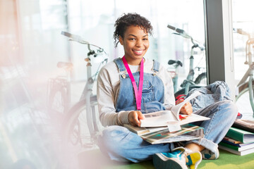 University student reading in lounge
