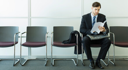 Businessman sitting in waiting area