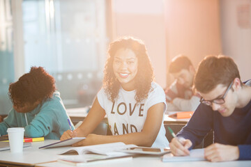 University student smiling in classroom